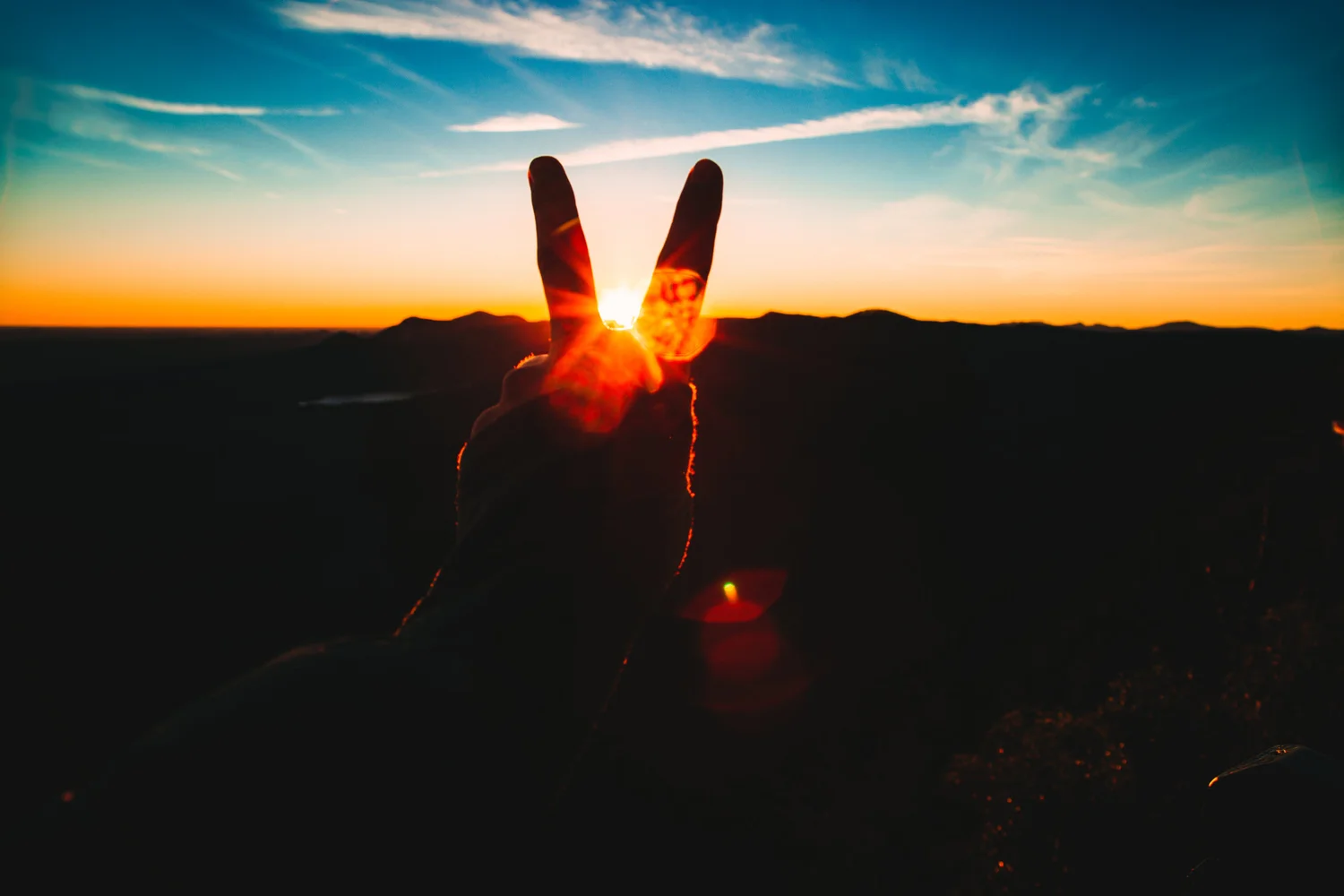 peace-sign-silhouette-sunrise